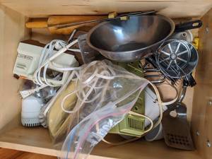 lot 64 image: Contents of Drawer Cookie Cutters, Sifter, Mixer, etc.