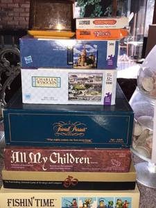 lot 73 image: Assorted Puzzles and Games Go, Trivial Pursuit, Fishin Time, etc.