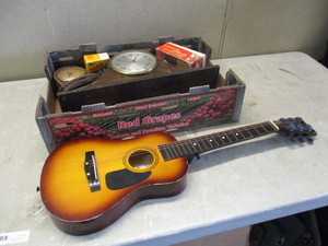 Vintage clocks and a Guitar