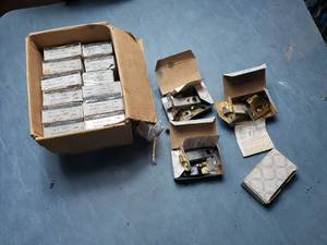 Box of New Door Latches and Deadbolts