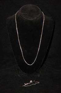lot 34 image: Sterling Silver Chain with a Broken 10K White Gold Chain