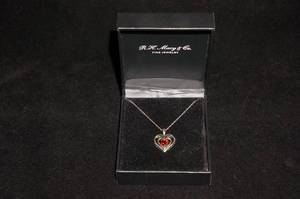 lot 46 image: RH Macy Sterling Silver Pendant with Chain