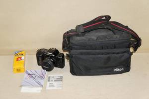 lot 22 image: Nikon N4004s 35mm SLR Camera with Lens