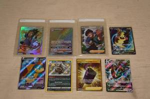 lot 57 image: 8 Full Art and Holo Pokemon Cards