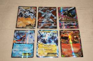 lot 61 image: 6 Full Art and Holo Pokemon EX and GX Cards