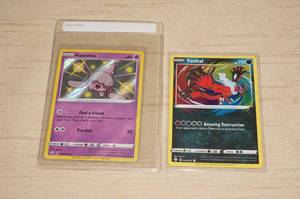 lot 63 image: 2 Holo Pokemon Cards - Hatenna, Yveltal