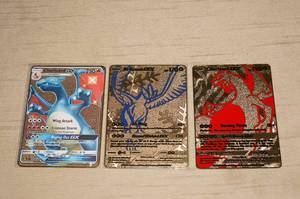lot 69 image: 3 Special Edition Metal Pokemon Cards - Charizard, Articuno