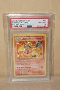lot 53 image: Graded 2016 Pokemon XY Charizard Holo Evolutions - PSA 8