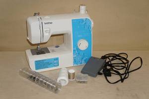 lot 115 image: Brother Sewing Machine, Some Accessories