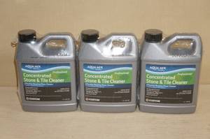lot 142 image: 3 Jugs of Aqua Mix Stone and Tile Cleaner