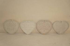 lot 180 image: Pampered Chef Heart Shaped Trivets