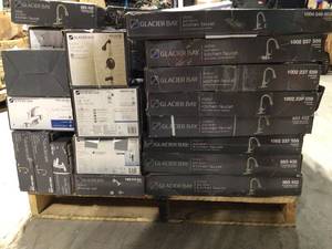 Pallet with assorted Glacier Bay Faucets open boxes and customer returns varopus conditions