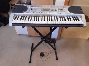 lot 64 image: Casio Keyboard With Stand Model# LK-45