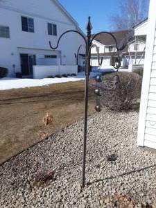 lot 126 image: 6 Ft. Shepherd Hook & Wind Chimes