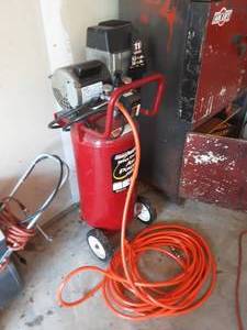 lot 137 image: Coleman Air Compressor