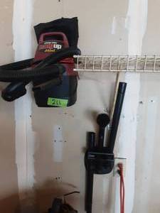 lot 211 image: Wall Mount Vacuum With Attachments