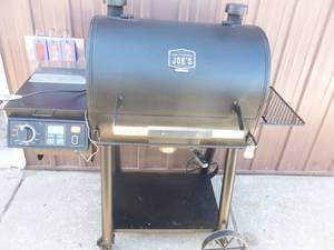 Oklahoma Joe smoker pellet grill. Lightly used. Shows code error 2 & we think it may need a new ignitor As shown.