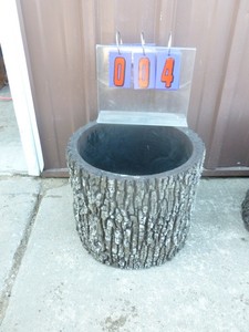 Surreal brand plastic planter. 15 x 13. As shown.