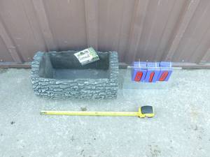 Surreal brand plastic planter. 10 x 16. As shown.