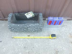 Surreal brand plastic planter. 10 x 16. As shown.