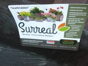 Surreal brand plastic planter. 10 x 16. As shown.