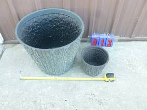 Qty of 2 Surreal brand plastic planters. 19 x 16 & 9 x 8. As shown.