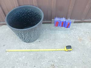 Surreal brand plastic planter. 16 x 12. As shown.