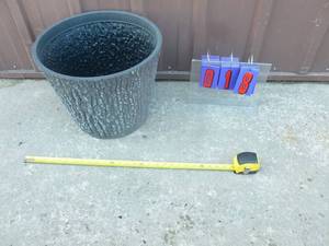 Surreal brand plastic planter. 16 x 12. As shown.
