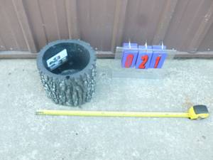 Surreal brand plastic planter. 10 x 8. As shown.