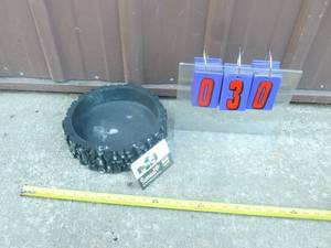 Surreal brand plastic planter. 10 x 3. As shown.