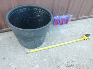 Surreal brand plastic planter. 16 x 12. As shown.