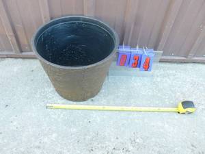 Surreal brand plastic planter. 16 x 12. As shown.