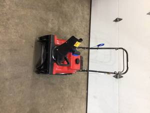 Toro Power Clear 518 ZE 18 in. Single-Stage Gas Snow Blower in working conditions