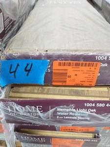 lot 44 image: Memphis Light Oak 8 mm Thick x 7-23 in. Wide x 50-58 in. Length Laminate Flooring (21.26 sq. ft.  case)