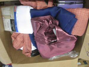 lot of curtains and towels ...