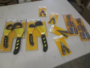 12-1 multitools , strap wrenches an...