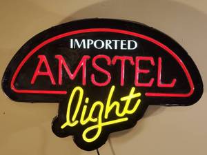 lot 21 image: Plastic Lighted Amsterdam Light Beer Mancave Wall Decor