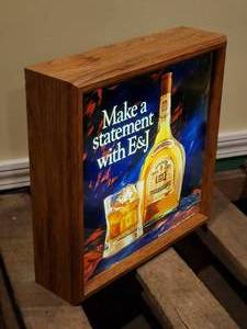 lot 62 image: Lighted E&J Brandy Mancave Wall Decor