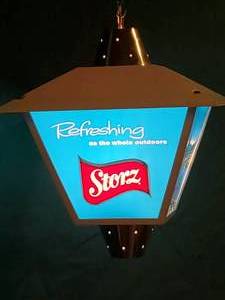 lot 67 image: Plastic Lighted Storz Beer Mancave Hanging Light