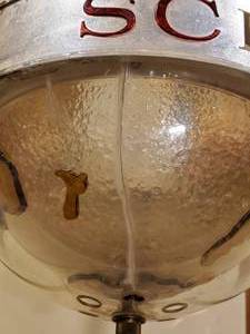 lot 222 image: Lighted Schlitz Rotating World Mancave Wall Decor