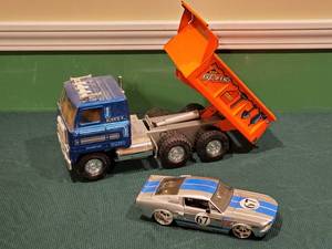 lot 263 image: Pressed Tin Ertl Dump Truck & a Die Cast 1967 Mustang