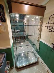 lot 331 image: Extremely Nice Lighted All Glass Rolling Display Case  Curio Cabinet with 4- Adjustable Glass Shelves