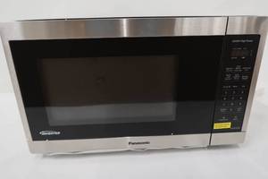 lot 258 image: Panasonic 1.3CuFt Stainless Steel Countertop Microwave Oven NN-SC668S