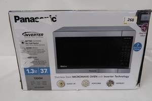 lot 268 image: Panasonic 1.3CuFt Stainless Steel Countertop Microwave Oven NN-SC668S