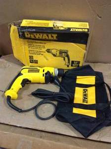 lot 58 image: 8 Amp Corded 38 in. Pistol Grip Drill by DEWALT Customer Returns See Pictures