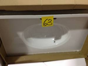 lot 63 image: 31 in. W x 19 in. D Cultured Marble Vanity Top in Solid White with Solid White Basin with 4 in. Faucet Spread Customer Returns See Pictures