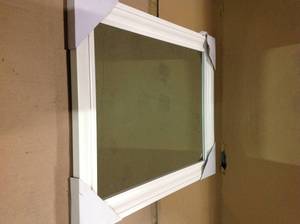 lot 94 image: 22.5 in. x 28.5 in. White Framed Mirror Customer Returns See Pictures
