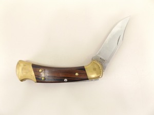 Buck 112 Folding Knife in Leather Belt Sheath