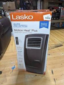 lot 123 image: Lasko Motion Heat Whole Room Ceramic Heater