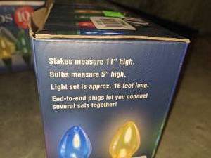 lot 101 image: 2 Sets of Outdoor Holiday Light Bulbs wStakes